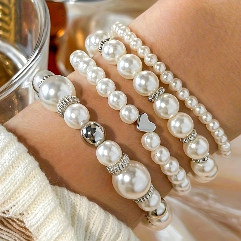 Set of elegant heart-shaped bracelets with pearls